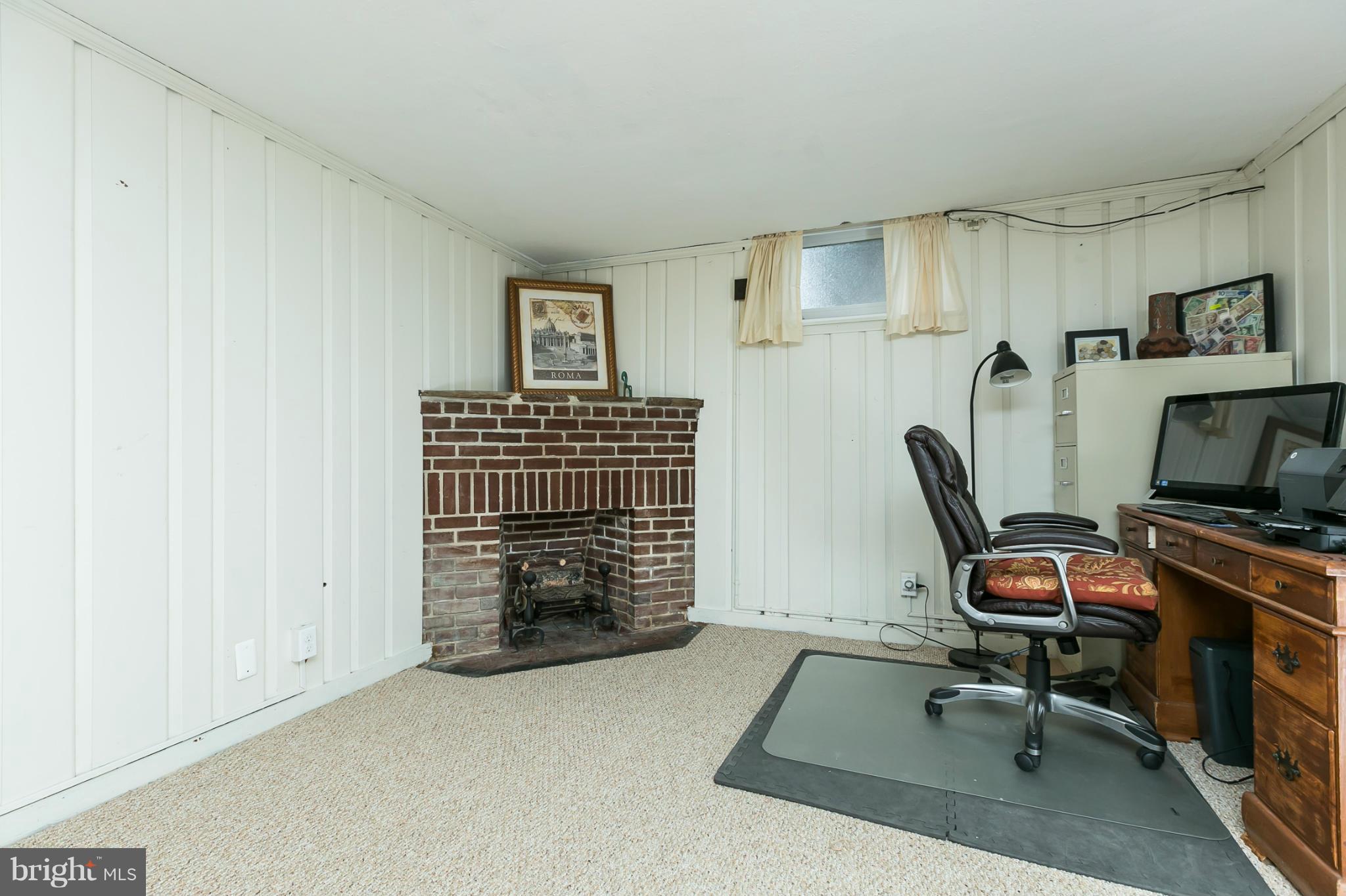 501 Anneslie Road Baltimore, MD 21212 - Photo 22 of 30 a view of a workspace with furniture and a window