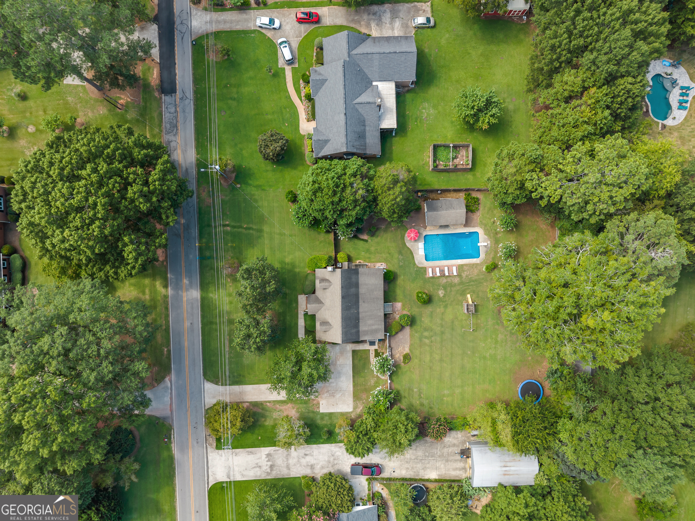 991 Crawford Street Madison, GA 30650 - Photo 3 of 25 an aerial view of a house