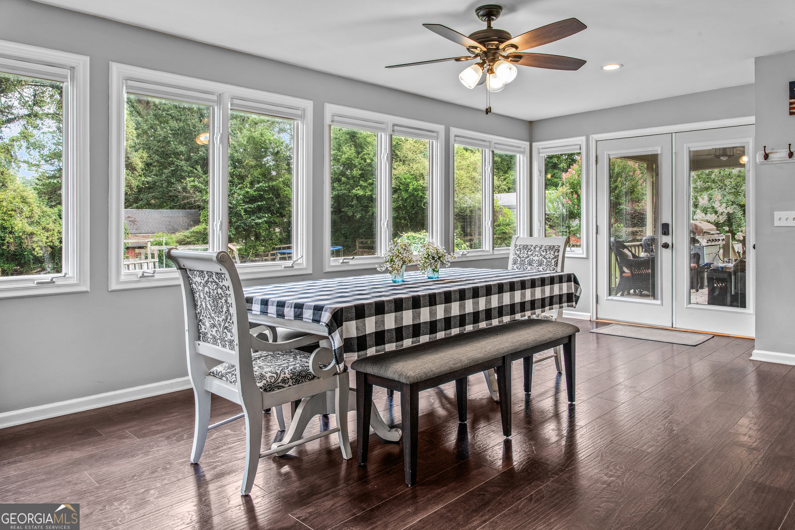 991 Crawford Street Madison, GA 30650 - Photo 7 of 25 a dining room with furniture window and wooden floor