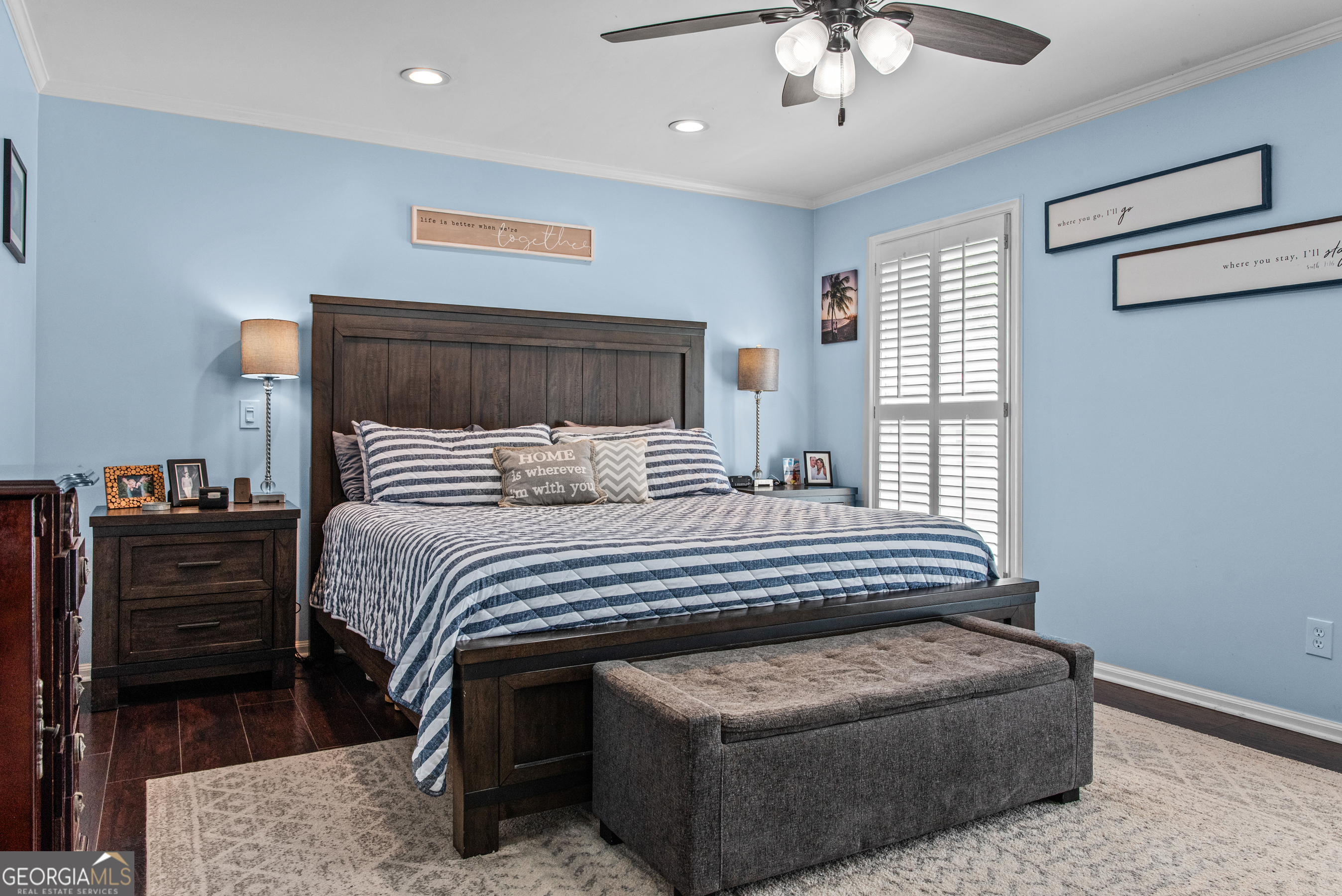 991 Crawford Street Madison, GA 30650 - Photo 9 of 25 a bedroom with bed and window