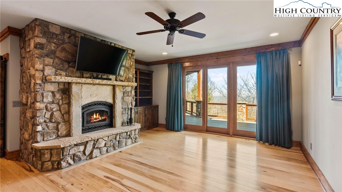 137 Burningbush Trail Boone, NC 28607 - Photo 25 of 50 a living room with furniture and a fireplace