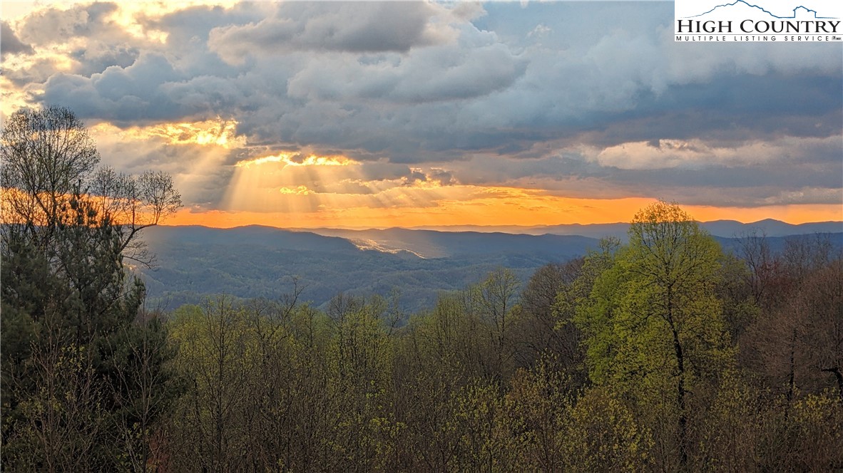 137 Burningbush Trail Boone, NC 28607 - Photo 3 of 50 a view of mountain with sunset