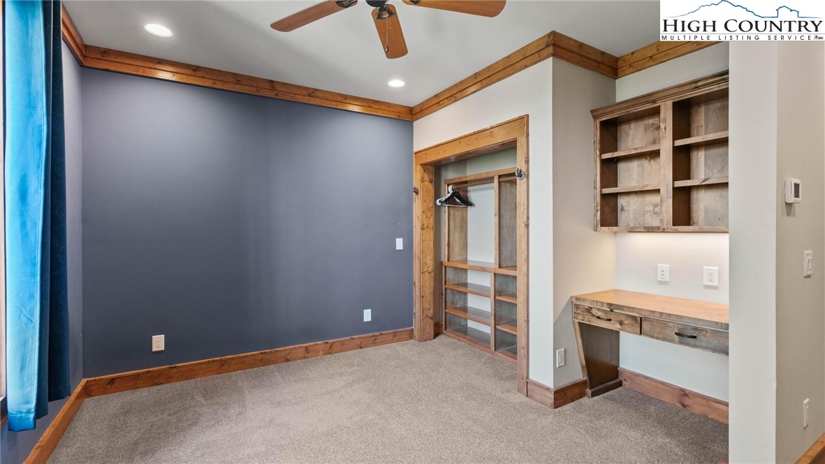 137 Burningbush Trail Boone, NC 28607 - Photo 34 of 50 a view of an empty room with a cabinet and a window