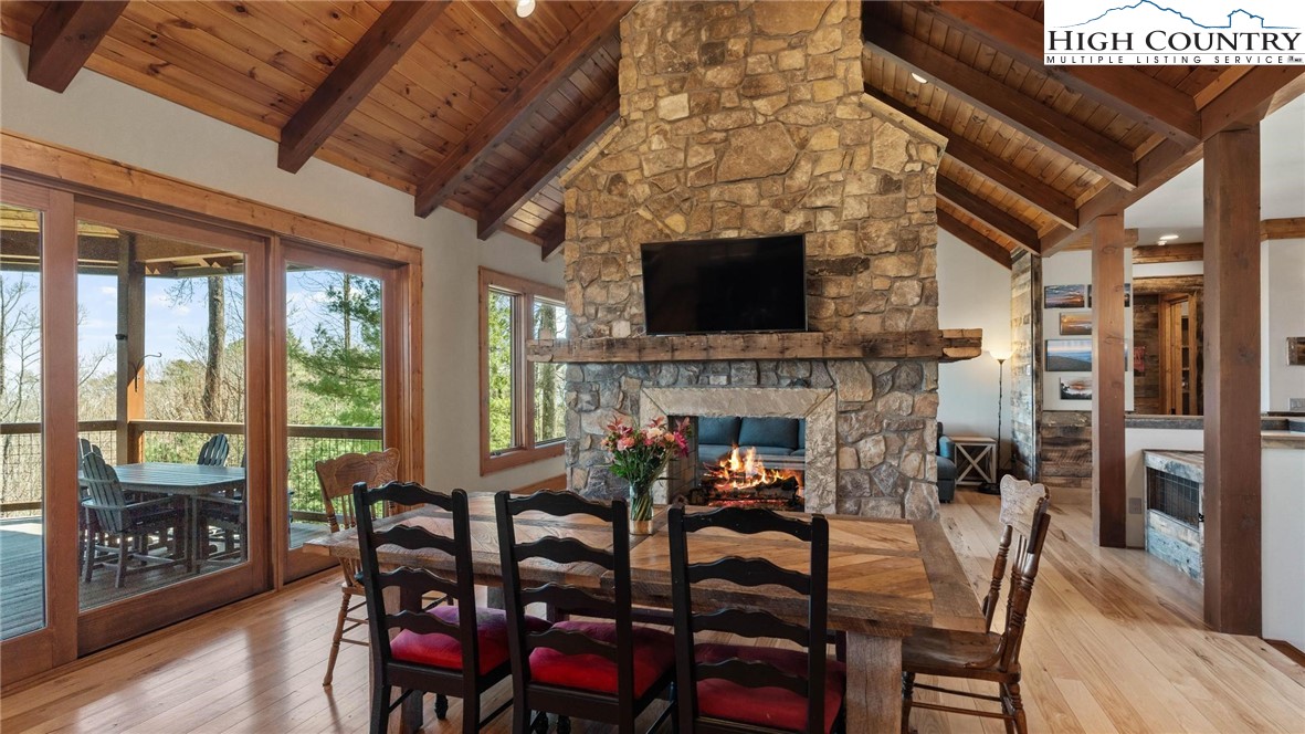 137 Burningbush Trail Boone, NC 28607 - Photo 10 of 50 a view of a dining room with furniture window and wooden floor