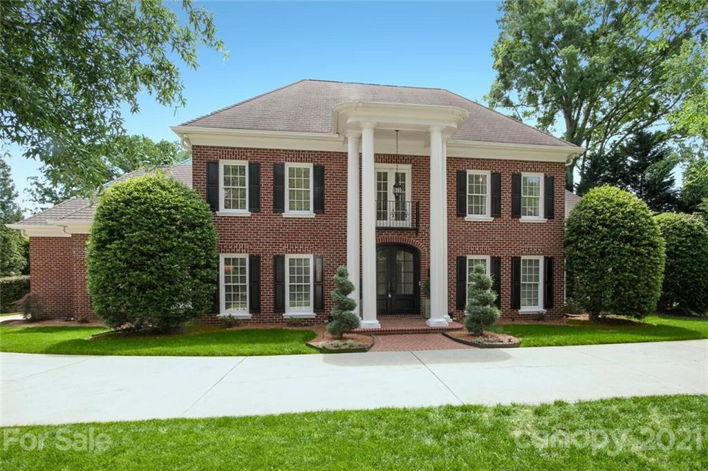 2125 South Wendover Road Charlotte, NC 28211 - Photo 1 of 48 front view of house with a yard