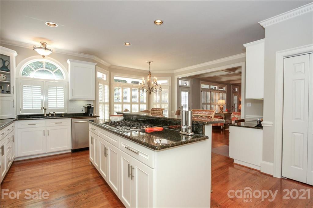 2125 South Wendover Road Charlotte, NC 28211 - Photo 17 of 48 a kitchen with stove and cabinets