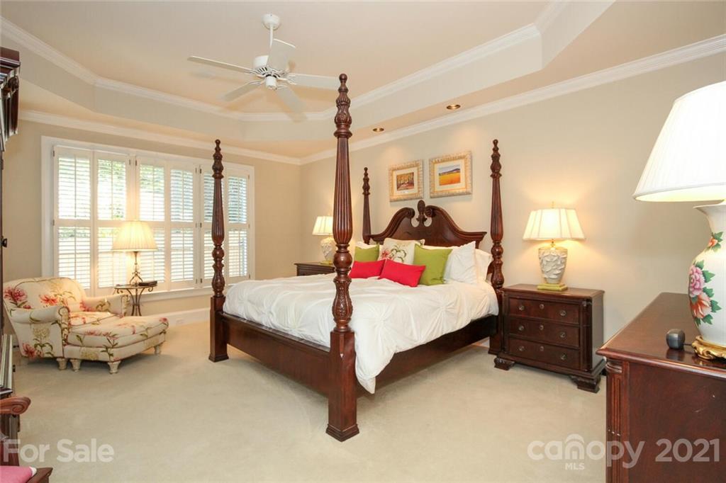 2125 South Wendover Road Charlotte, NC 28211 - Photo 22 of 48 a spacious bedroom with a bed and a window