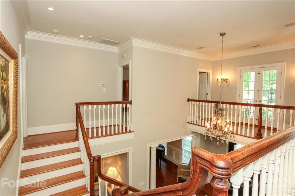 2125 South Wendover Road Charlotte, NC 28211 - Photo 28 of 48 a view of an entryway wooden floor and a window