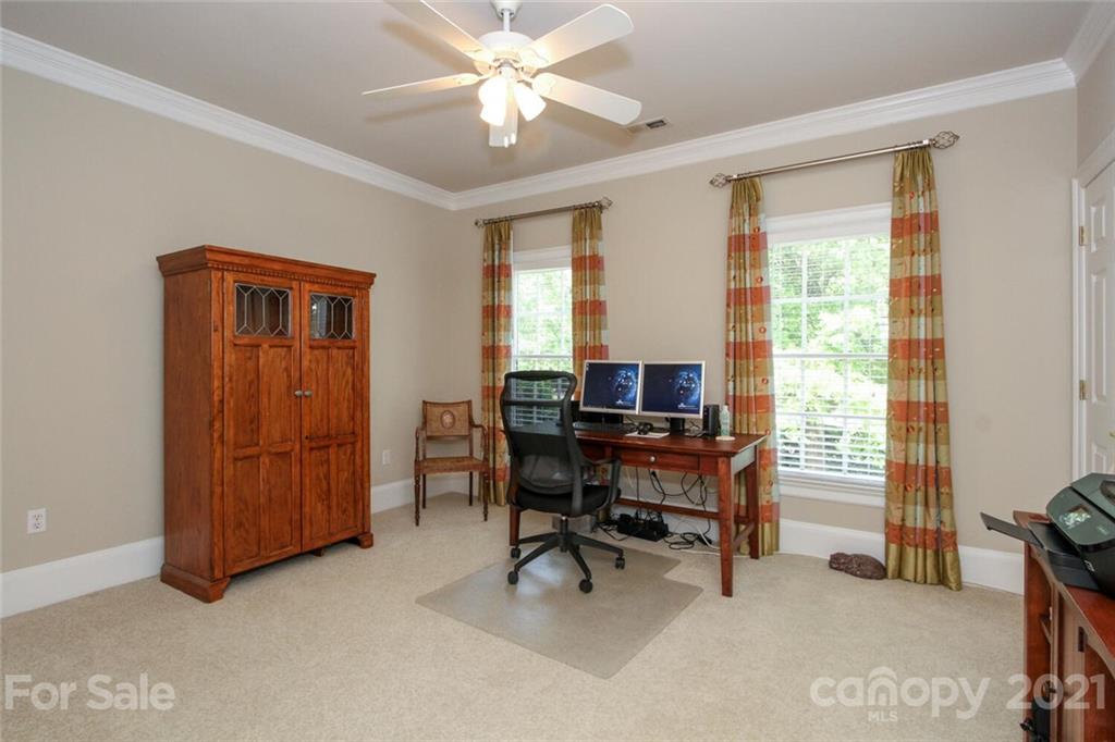 2125 South Wendover Road Charlotte, NC 28211 - Photo 35 of 48 a view of a workspace with furniture and a window