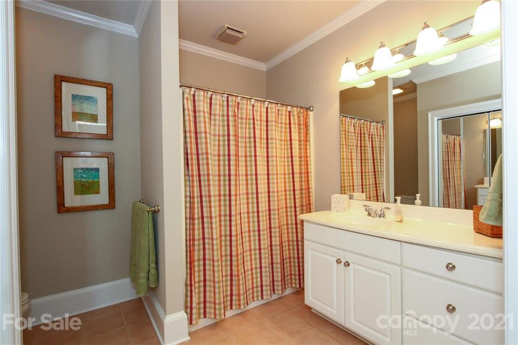 2125 South Wendover Road Charlotte, NC 28211 - Photo 36 of 48 a bathroom with a double vanity sink mirror and double