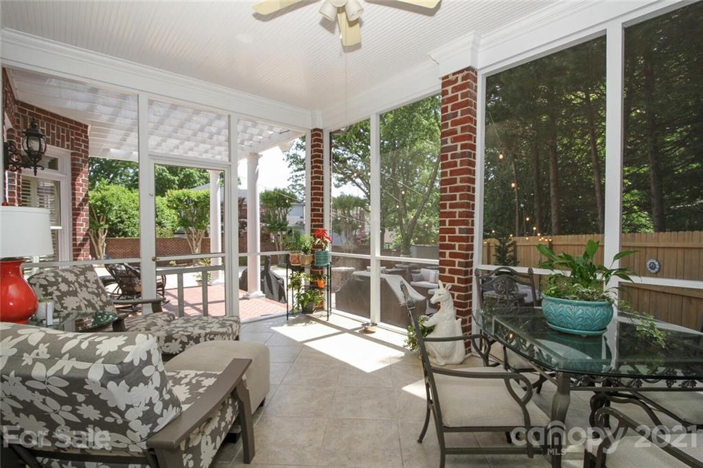 2125 South Wendover Road Charlotte, NC 28211 - Photo 37 of 48 a living room filled with furniture and a large window