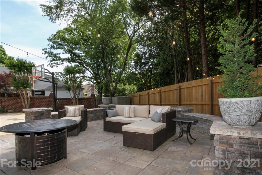 2125 South Wendover Road Charlotte, NC 28211 - Photo 42 of 48 a view of backyard with outdoor seating a patio and plants