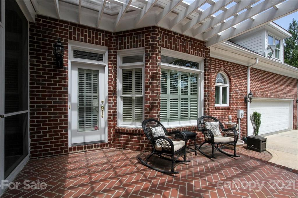 2125 South Wendover Road Charlotte, NC 28211 - Photo 43 of 48 a view of a patio with couple of chairs