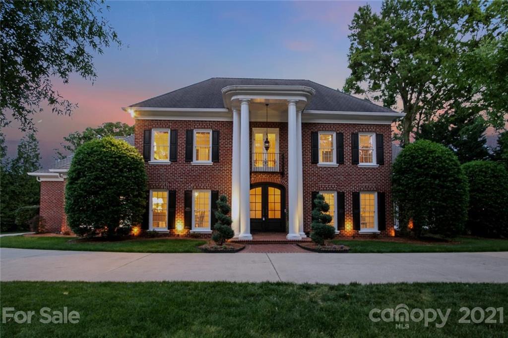 2125 South Wendover Road Charlotte, NC 28211 - Photo 6 of 48 a front view of a house with a yard