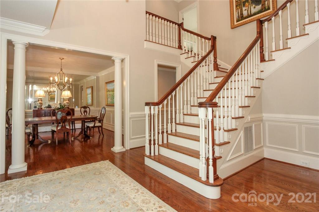 2125 South Wendover Road Charlotte, NC 28211 - Photo 9 of 48 a view of entryway and hall with wooden floor
