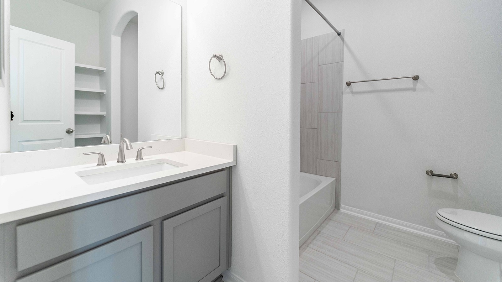 294 Rubber Tree Way Buda, TX 78610 - Photo 10 of 19 Full bath with vanity and tub / shower combination