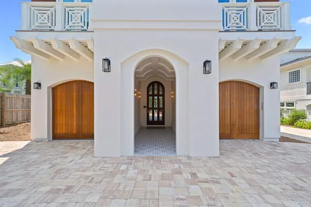 a large kitchen with stainless steel appliances granite countertop a stove and a refrigerator