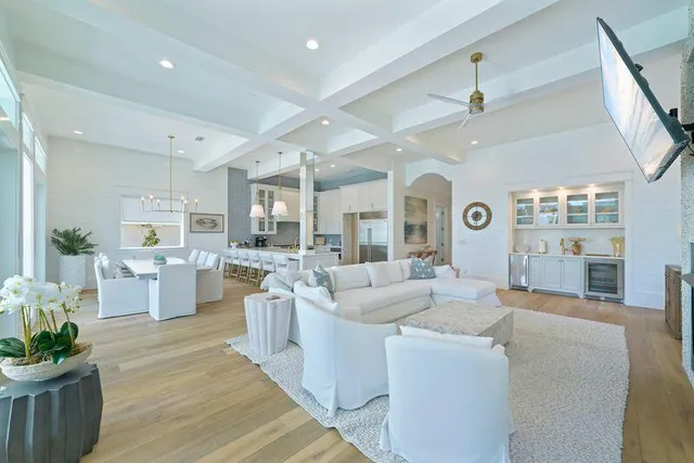 a large kitchen with a table and chairs
