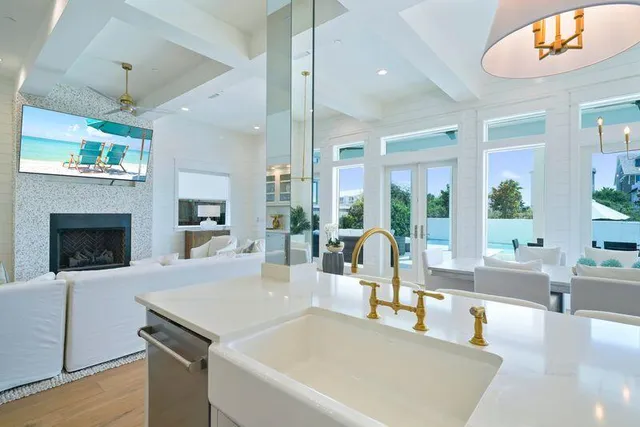 a spacious bedroom with a bed and wooden floor