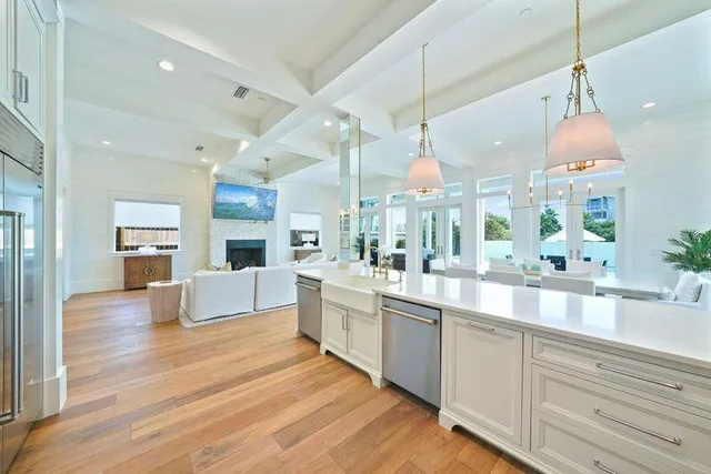 a spacious bedroom with a bed and furniture