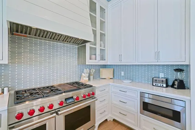 a view of a balcony with furniture