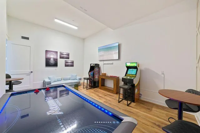 a bedroom with a bed and furniture