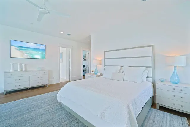 a bathroom with a sink shower and a mirror