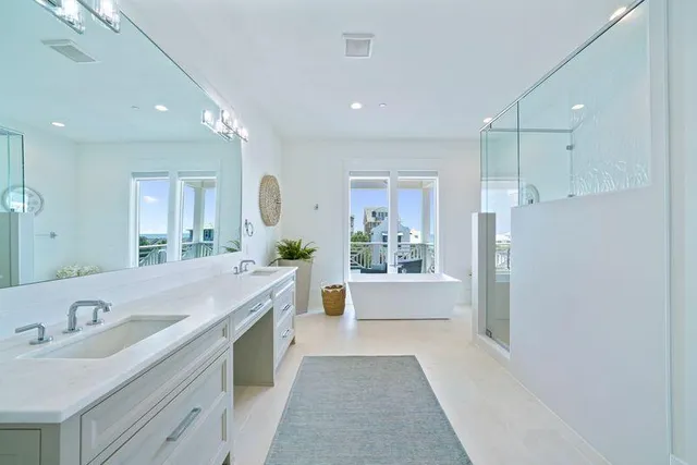 a bedroom with a bed and a night stand