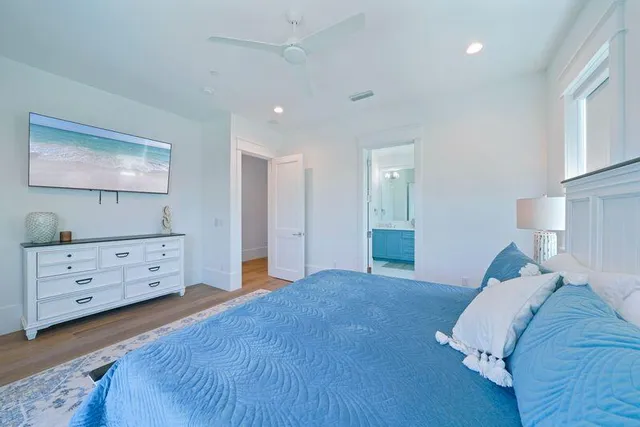 a living room with a bed furniture and a window