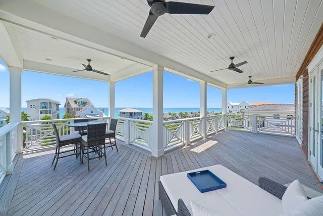 a bathroom with a shower sink large mirror and vanity