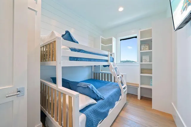 a dining room with furniture a rug and a chandelier