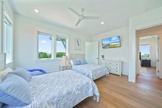 a view of balcony with couch and chairs
