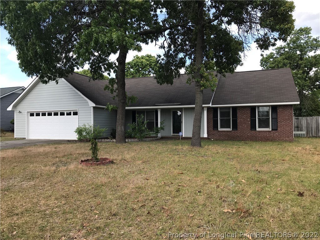 713 Rim Road Fayetteville, NC 28314 - Photo 1 of 16 front view of a house with a yard
