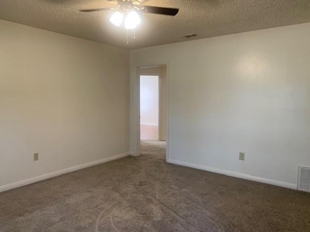 3912 North 22nd Street Waco, TX 76708 - Photo 2 of 16 an empty room with a empty space and windows