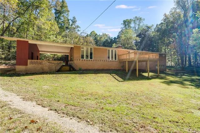 a house view with a backyard space