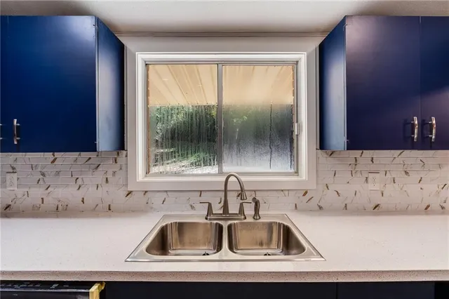 a view of living room with furniture and flat screen tv
