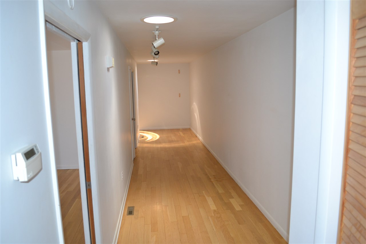 58 Courthouse Mountain Road Madison, VA 22727 - Photo 25 of 37 a view of a hallway with wooden floor