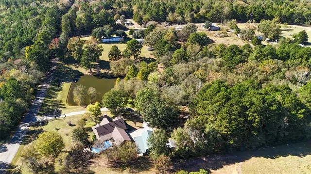 a view of a chairs and table in a patio