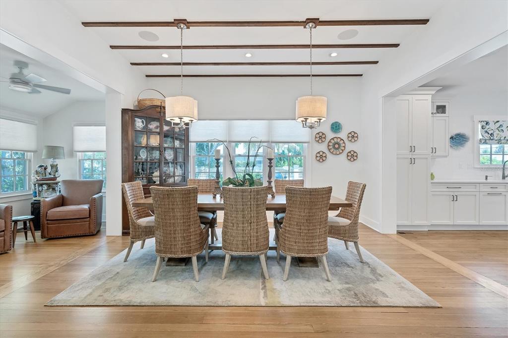 342 Palm Avenue Boca Grande, FL 33921 - Photo 15 of 47 a dining room with furniture a rug and wooden floor