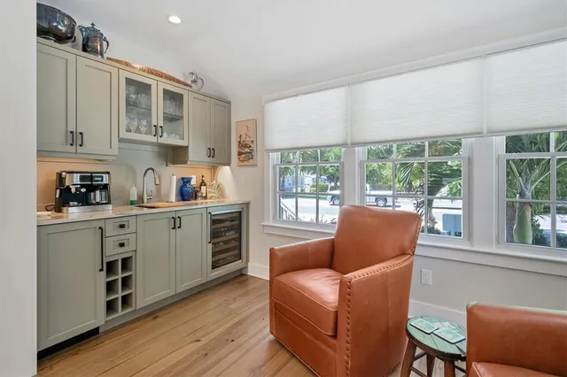 a living room with furniture and windows