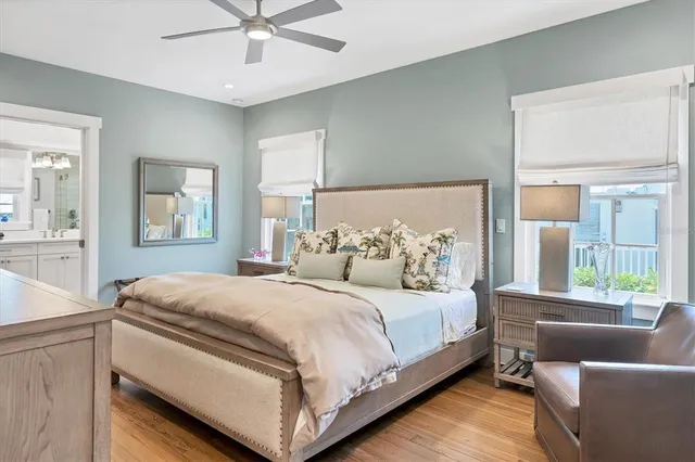 a bedroom with a bed and a couch