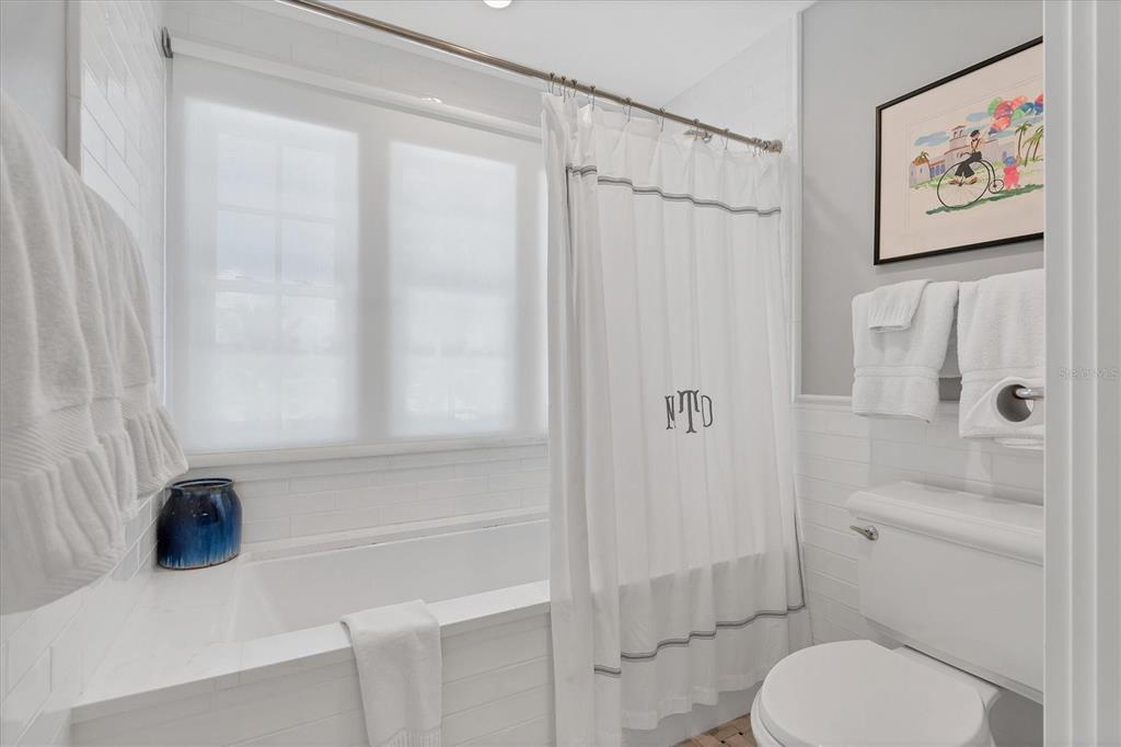 342 Palm Avenue Boca Grande, FL 33921 - Photo 33 of 47 a bathroom with a toilet and a shower