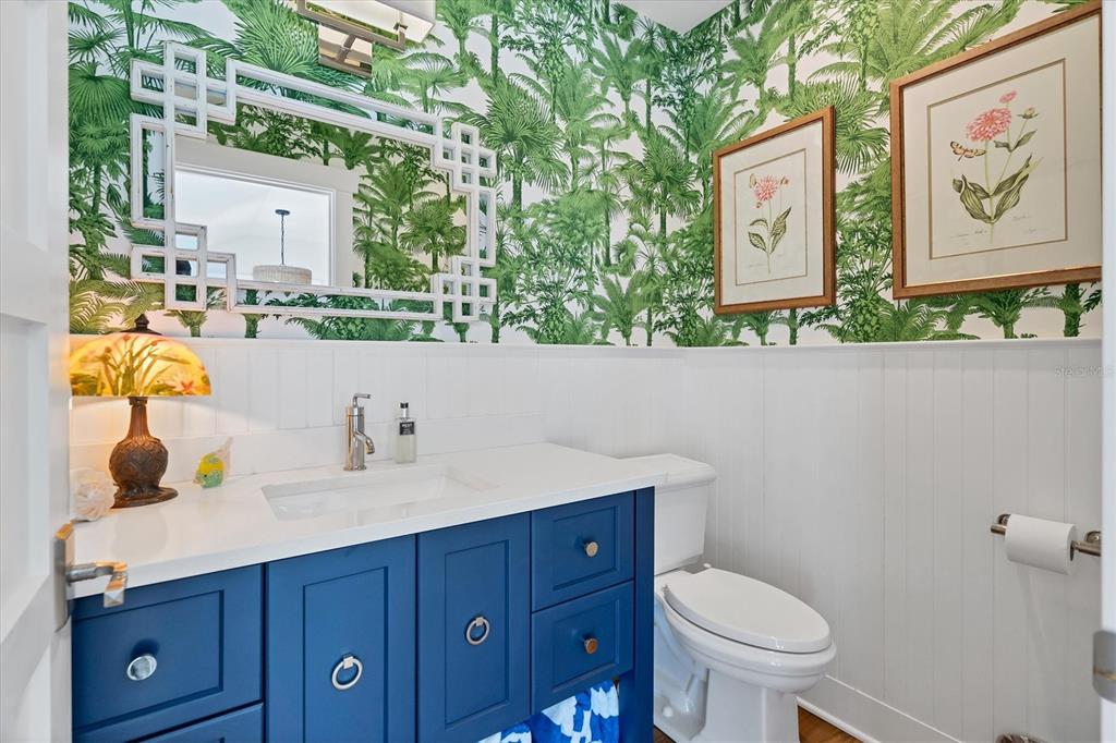 342 Palm Avenue Boca Grande, FL 33921 - Photo 35 of 47 a bathroom with a toilet sink and mirror