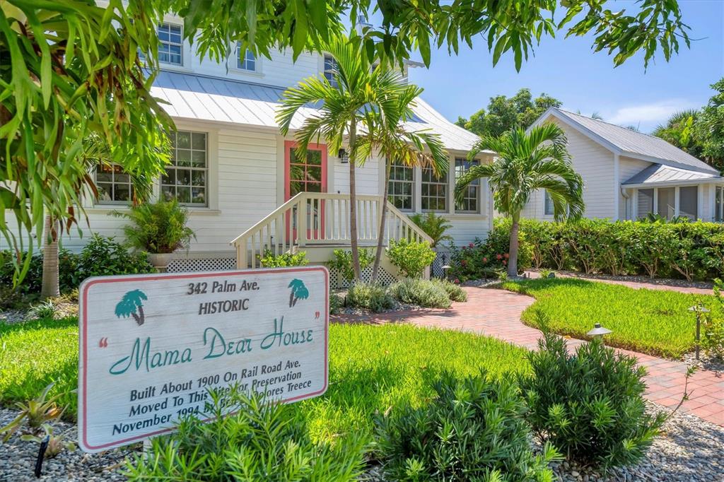 342 Palm Avenue Boca Grande, FL 33921 - Photo 7 of 47 a sign on the side of a building