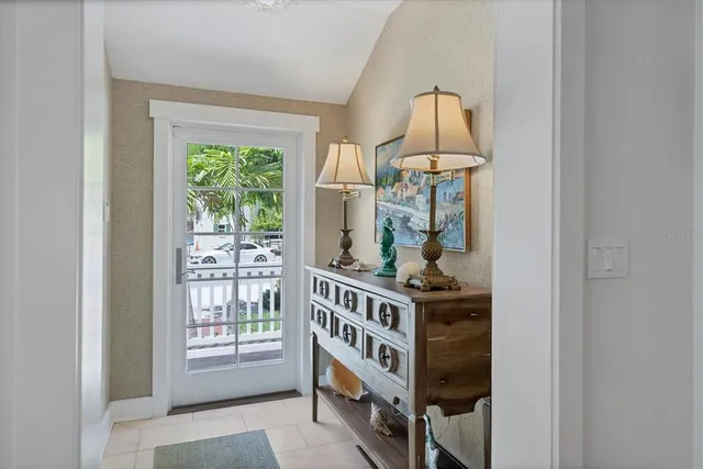 an empty room with windows and outdoor view
