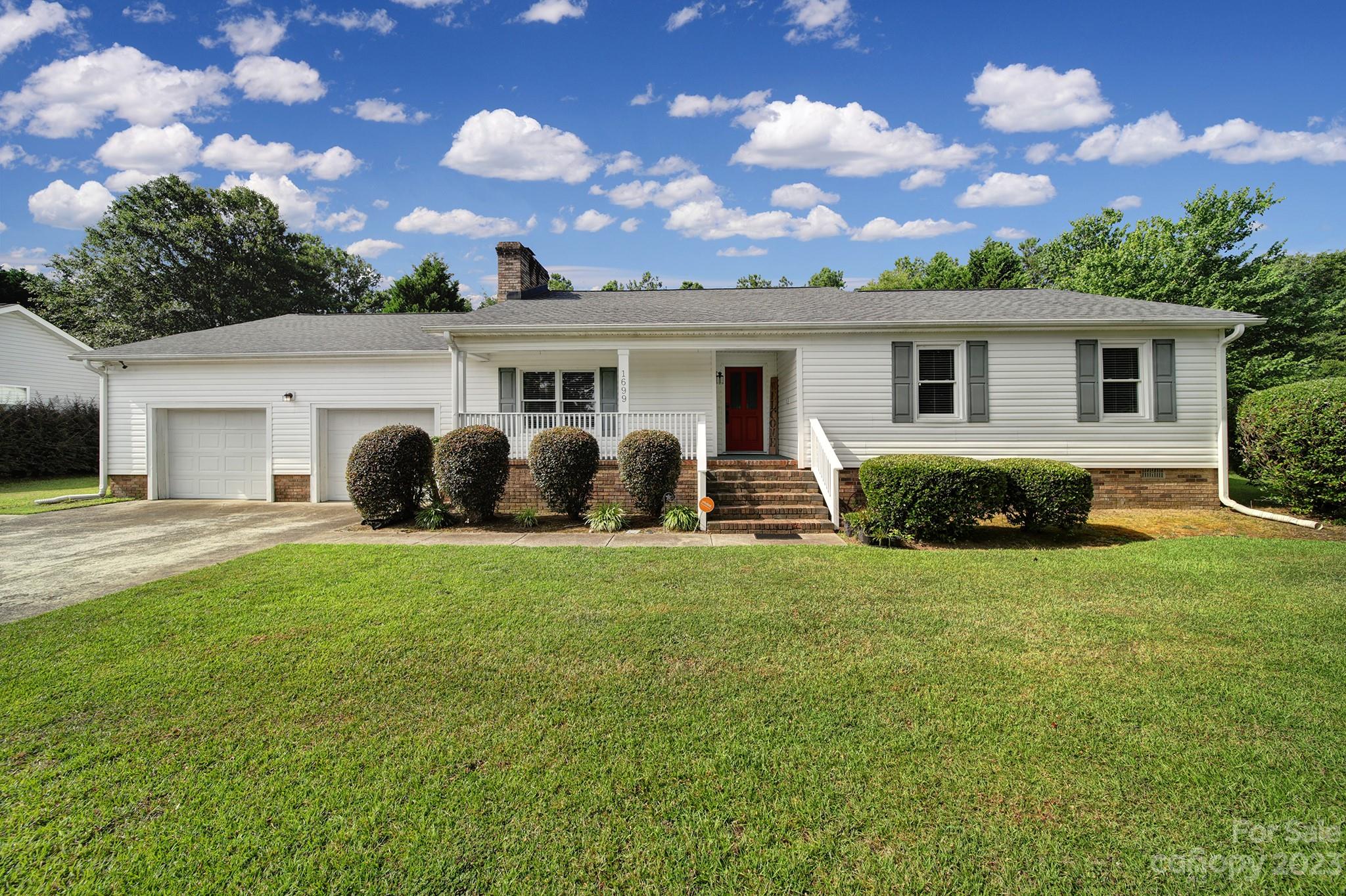 1699 Willowbrook Drive Fort Mill, SC 29708 - Photo 2 of 40 a view of a house with backyard