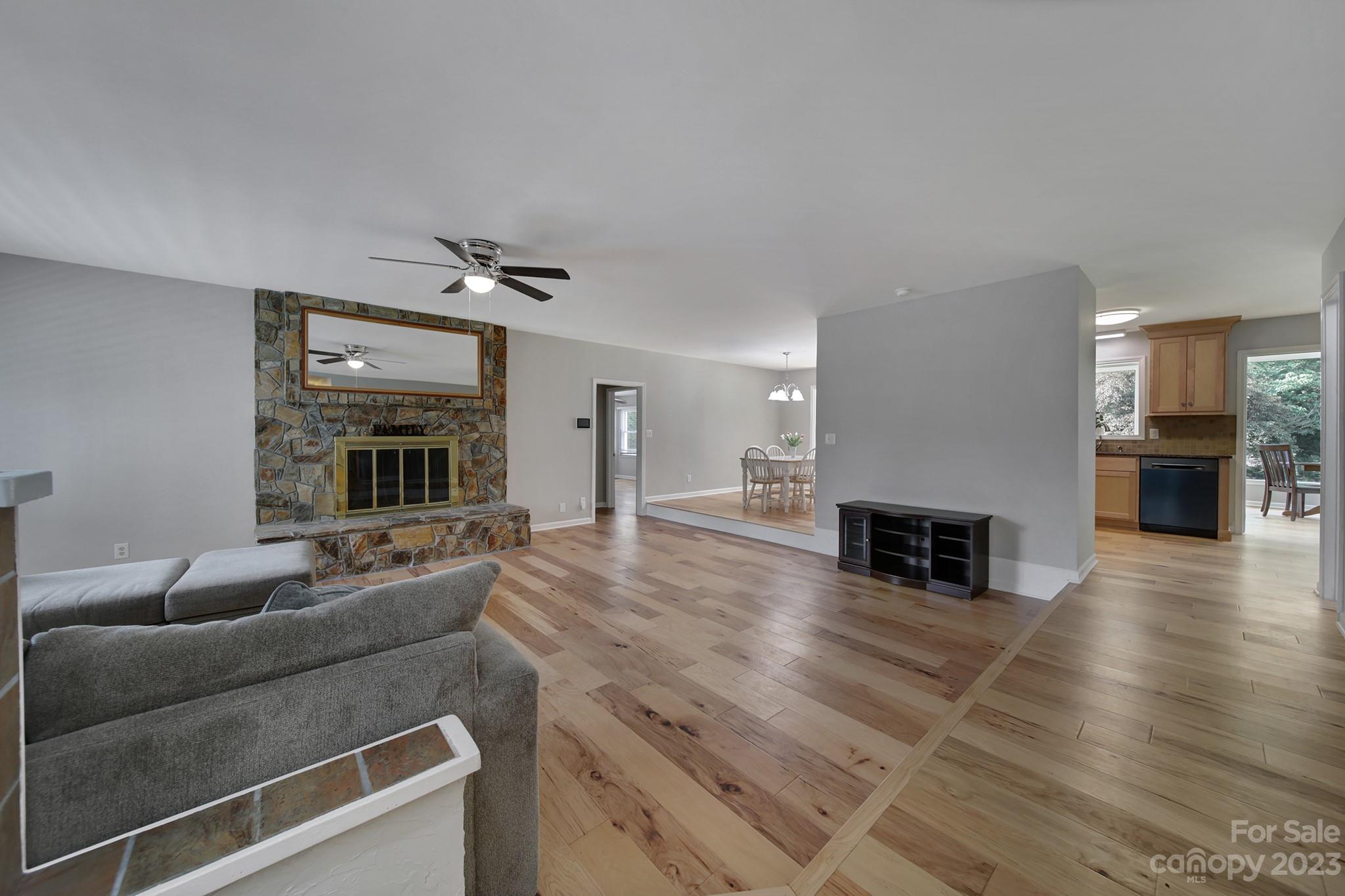 1699 Willowbrook Drive Fort Mill, SC 29708 - Photo 5 of 40 a living room with furniture and a fireplace