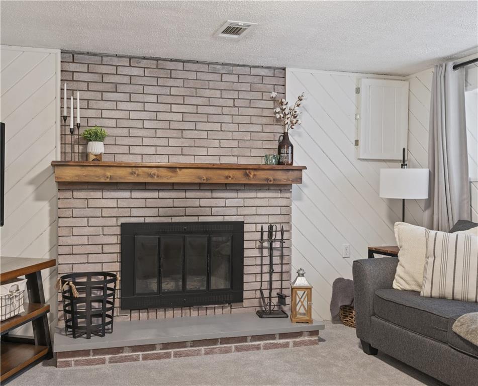 10 Rolling Road Cranberry Township, PA 16066 - Photo 29 of 39 Gather round the cozy log burning fireplace!
