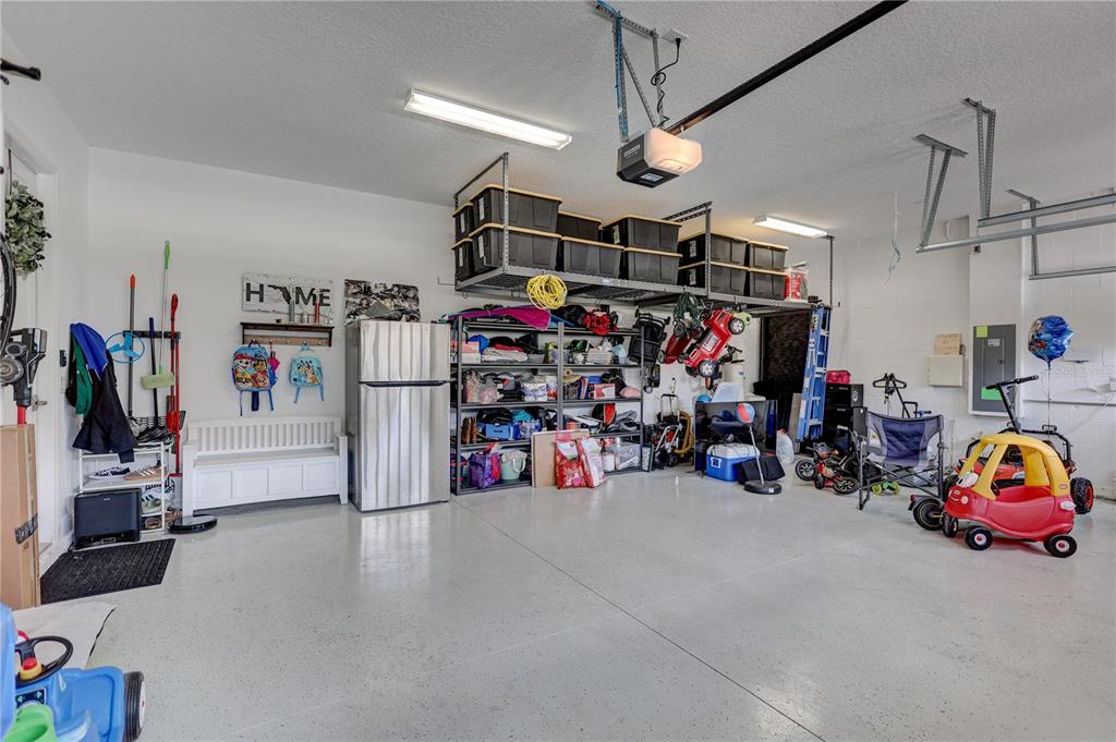 4593 Shoreleaf Loop Valrico, FL 33596 - Photo 32 of 39 a storage room with lot of stuff