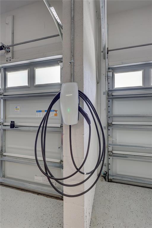 4593 Shoreleaf Loop Valrico, FL 33596 - Photo 33 of 39 a bathroom with a toilet and a mirror